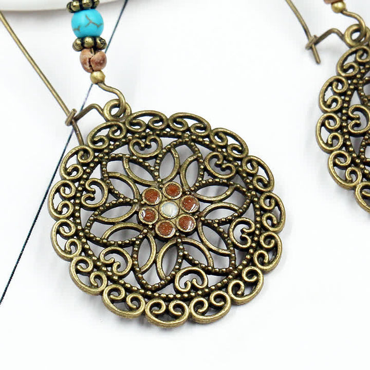 Boucles d'oreilles pendantes porte-bonheur à motif de fleurs rondes