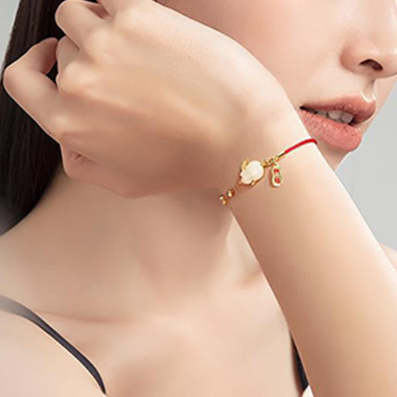 Bracelet en chaîne rouge en jade blanc et pierres de Buddha Stones Année du lapin