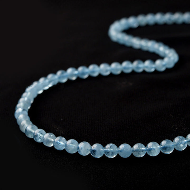 Bracelet de guérison de la paix en aigue-marine naturelle de Buddha Stones