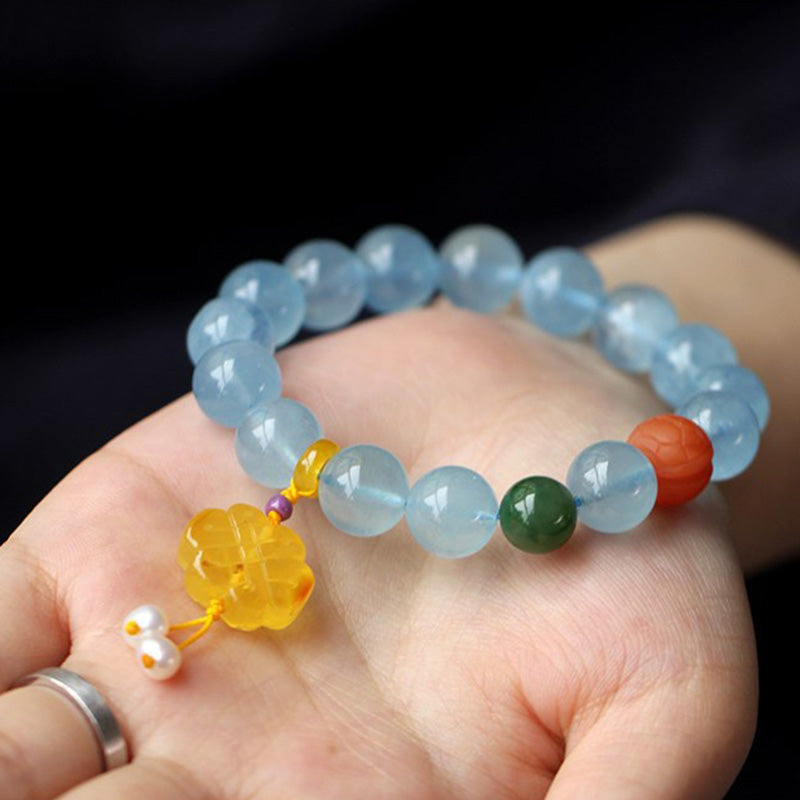 Bracelet de paix avec breloque en ambre et aigue-marine naturelle