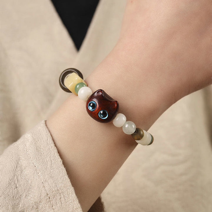 Buddha Stones Graine de Bodhi Bois de santal vert Bois d'ébène Petite feuille Bois de santal rouge Tête de chat Patte Griffe Bracelet de paix - image 14