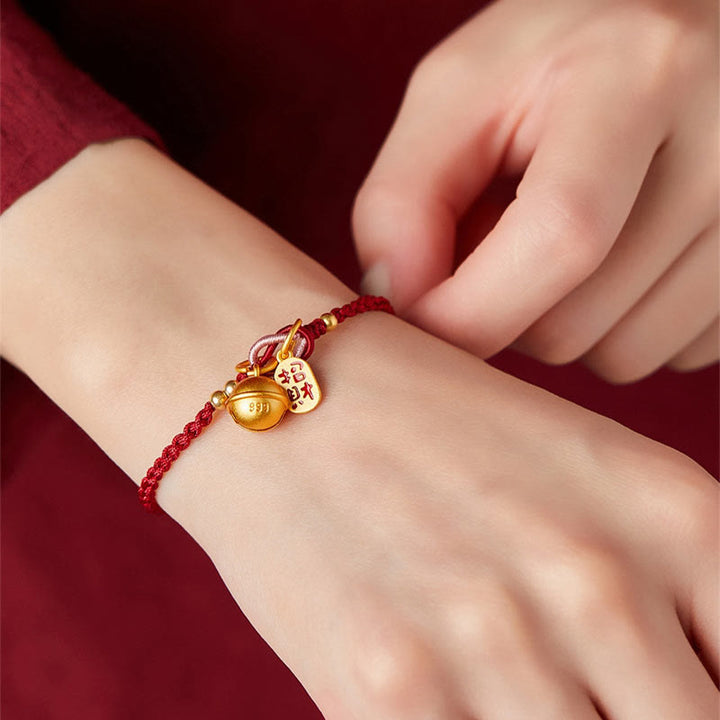 Bracelet en corde rouge avec breloque en forme de personnage Fu fait à la main en Buddha Stones