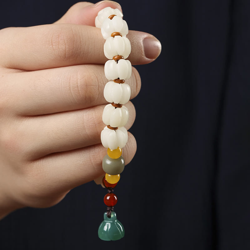Bracelet en perles de citrouille gravées en agate rouge Bodhi Calme Harmonie Bodhi Graines naturelles Lotus