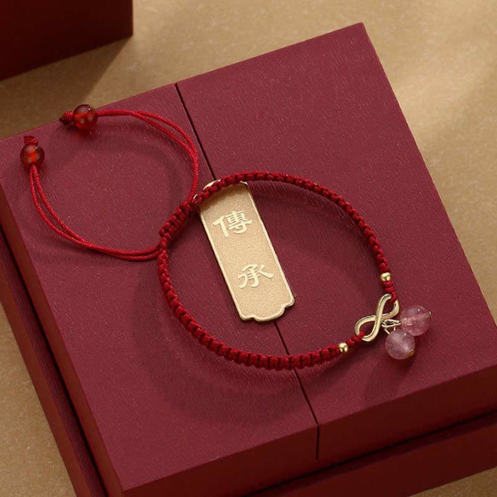 Bracelet tissé en fil rouge avec nœud sans fin en cristal de quartz fraise et Buddha Stones