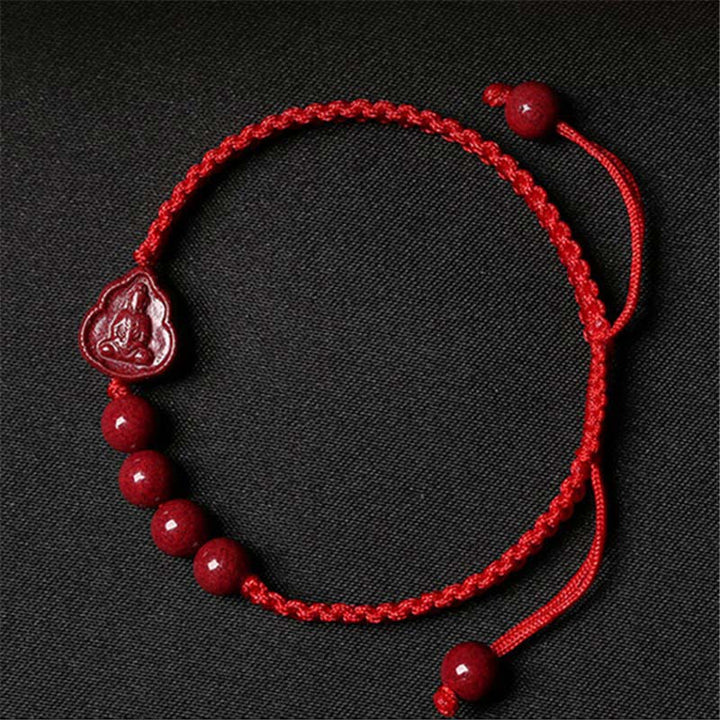 Bracelet en cordon de bénédiction en cinabre Bouddha rieur Avalokitesvara de Buddha Stones