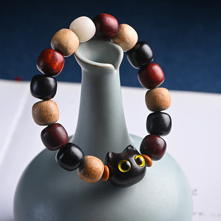 Bracelet de protection gravé en bois de santal rouge et ébène avec petites feuilles de Buddha Stones et chat mignon - image 3