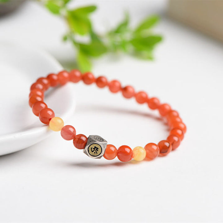 Bracelet d'acceptation de soi en agate rouge et ambre avec amulette du zodiaque chinois en argent sterling 925 de Buddha Stones - Bouddha Chien/Cochon-Amitabha - 8 mm - image 0