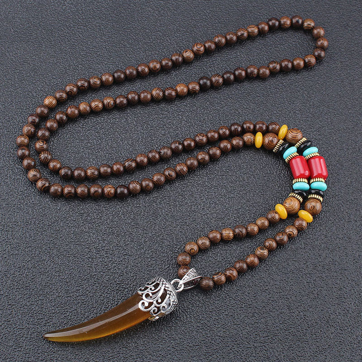 Collier pendentif de méditation en bois de wengé et pierre turquoise de style corne