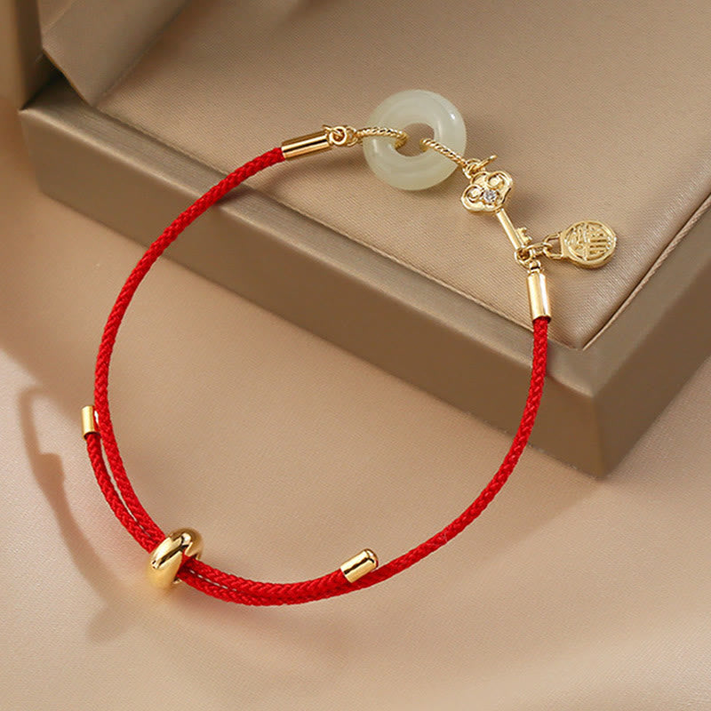 Bracelet en corde rouge avec boucle de paix en jade Hetian plaqué or 18 carats et Buddha Stones