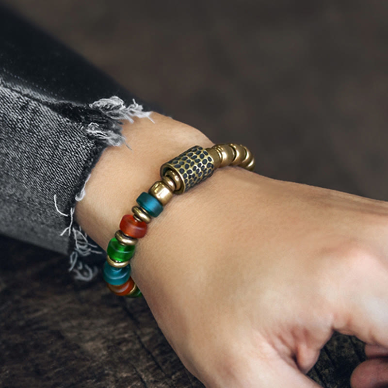Bracelet tibétain en perles de verre colorées et en cuivre