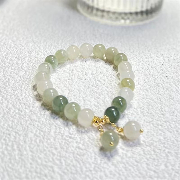 Bracelet porte-bonheur en perles de jade à dégradé naturel et Buddha Stones