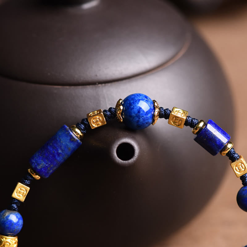 Bracelet en corde positive en perles de lazurite naturelles faites à la main avec des Buddha Stones
