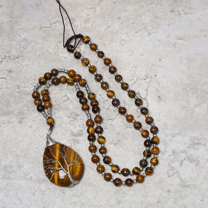 Collier avec pendentif en perles de force en œil de tigre naturel et Buddha Stones
