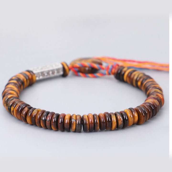 Bracelet de protection et de pouvoir tibétain en Buddha Stones et œil de tigre Om Mani Padme Hum