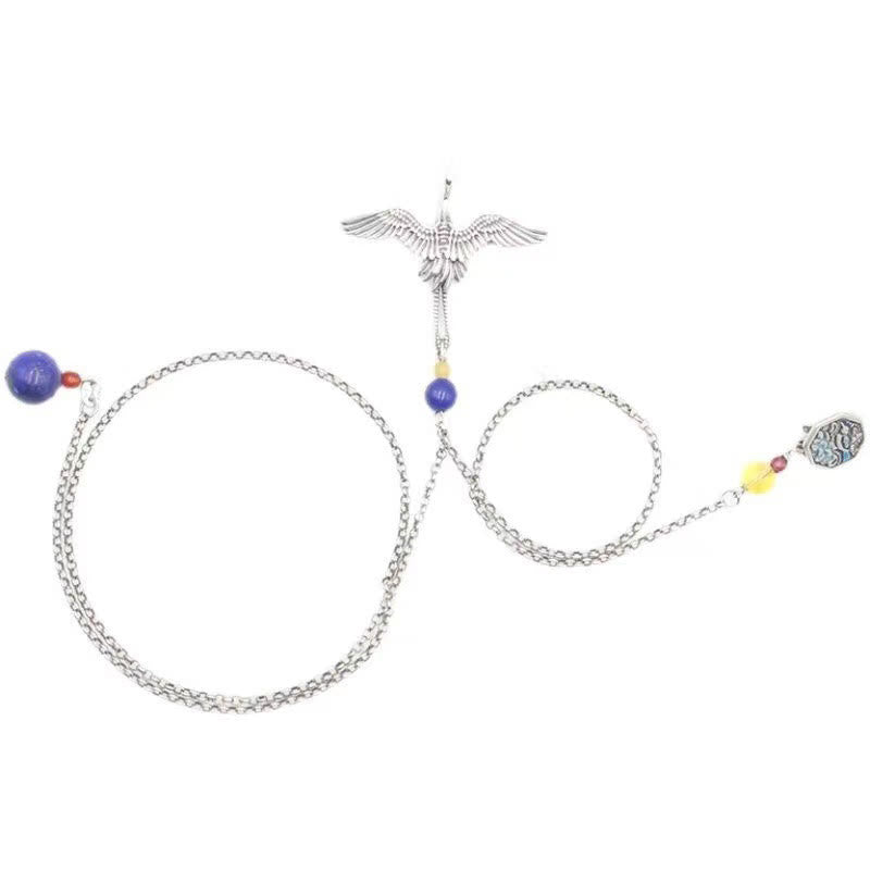 Broche en cuivre avec grue vintage et Buddha Stones