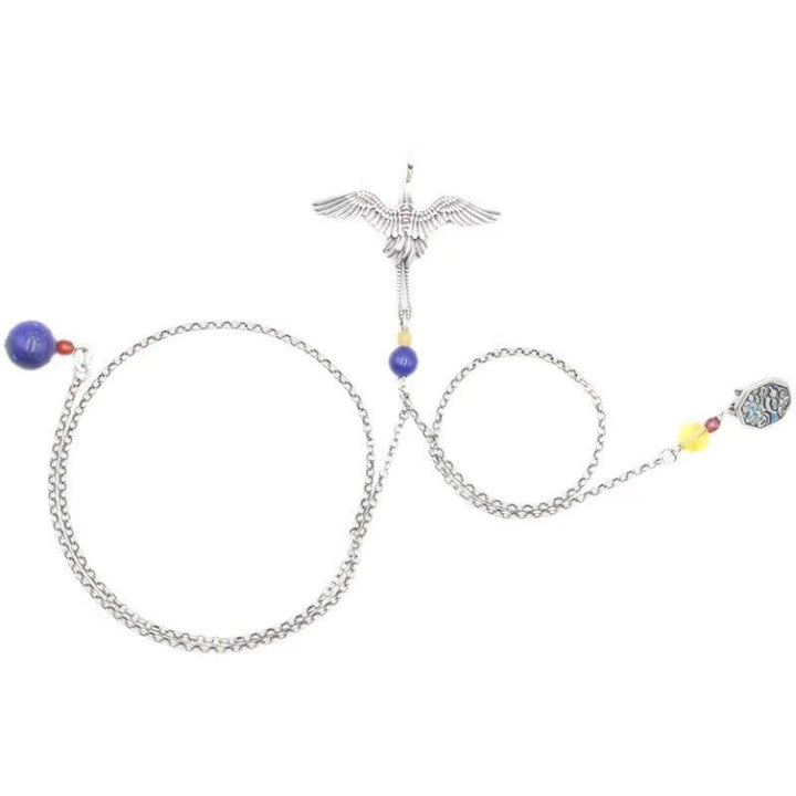 Broche en cuivre avec grue vintage et Buddha Stones