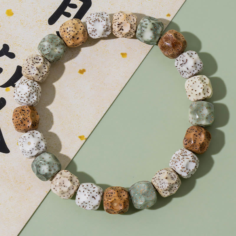 Bracelet de richesse et de bon augure en Buddha Stones naturelles et colorées