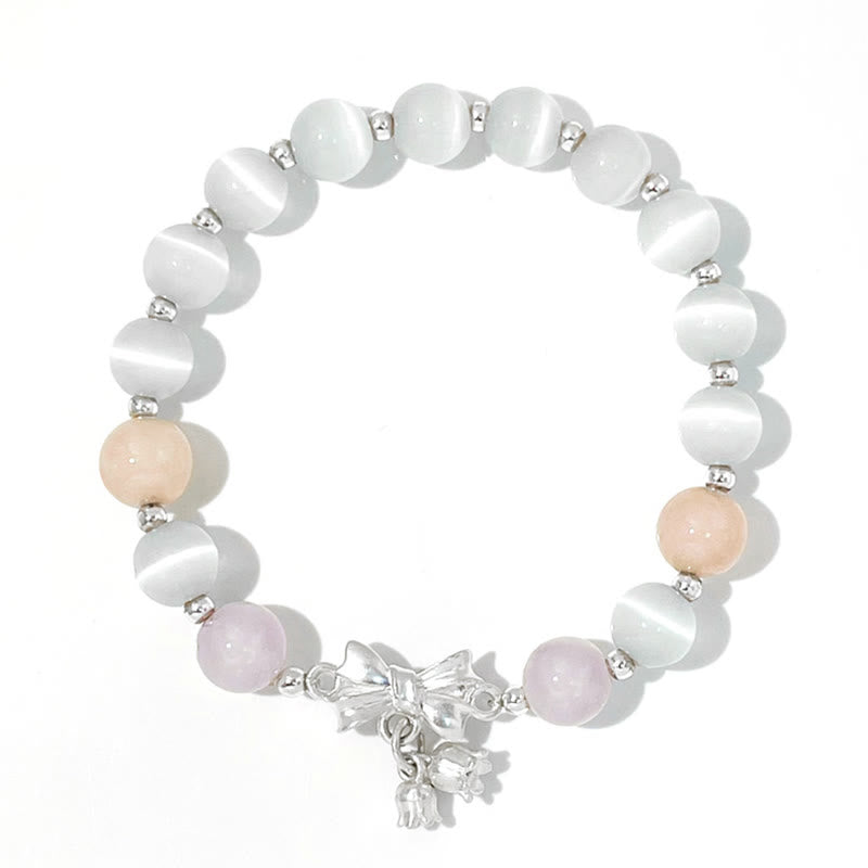 Bracelet à breloques en forme de rosette avec œil de chat, lavande et améthyste de Buddha Stones