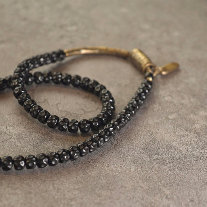 Bracelet triple tour en cuivre et coquille de noix de coco rétro Buddha Stones