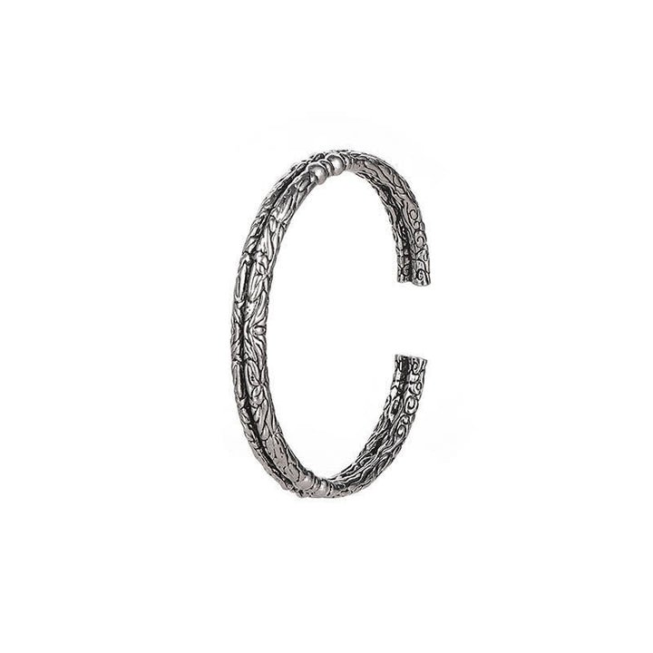 Bracelet manchette d'équilibre gravé à motif de dragon fleuri