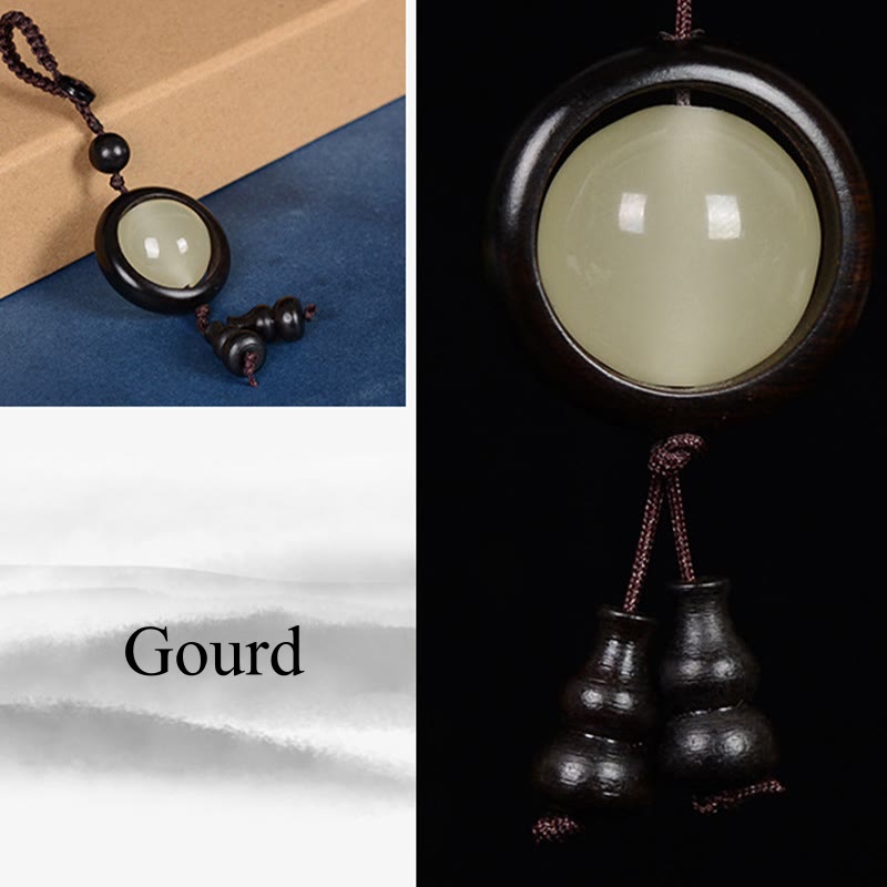 Porte-clés porte-bonheur lumineux en Buddha Stones en bois de santal rouge et bois d'ébène en bois de santal vert