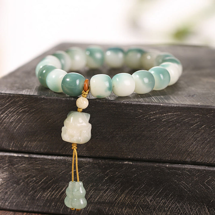 Bracelet de paix en forme de pomme de pin et de patte de chat, motif de Buddha Stones dégradées, graines de Bodhi, renard à neuf queues - image 5