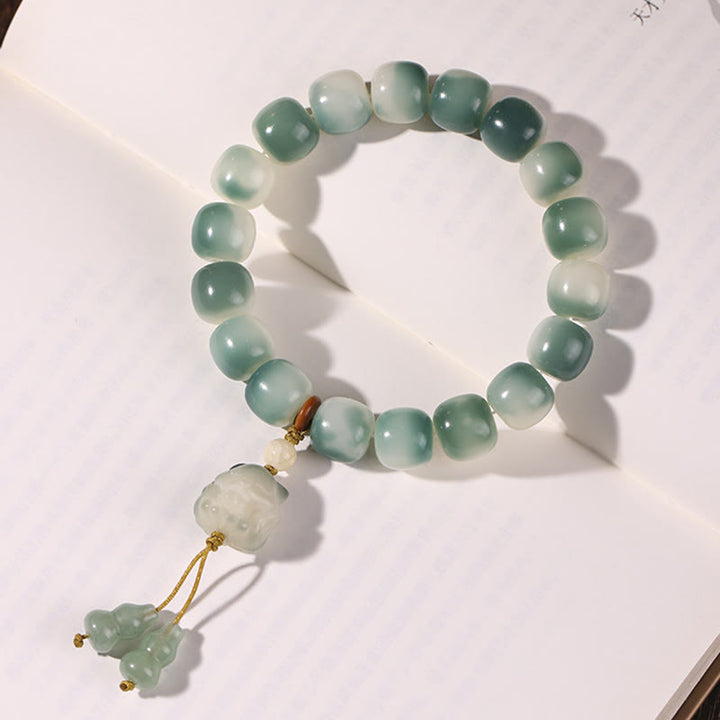 Bracelet de paix en forme de pomme de pin et de patte de chat, motif de Buddha Stones dégradées, graines de Bodhi, renard à neuf queues - image 6