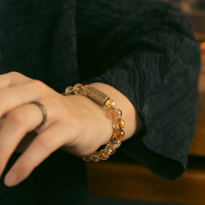 Bracelet de protection en perles de cristal de citrine naturelle et de laiton Buddha Stones
