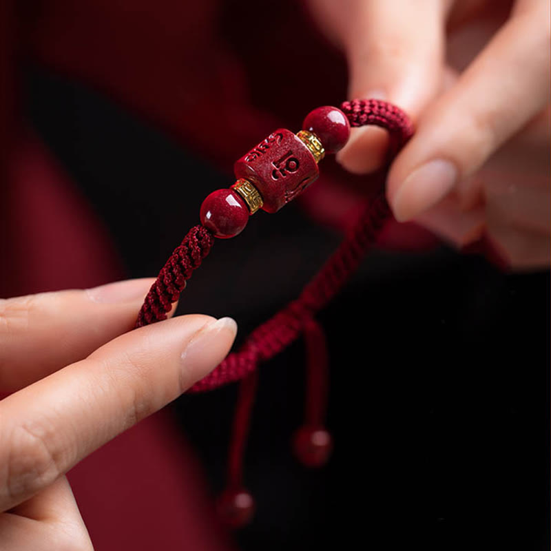Bracelet tressé avec Buddha Stones tibétaines en cinabre Om Mani Padme Hum gravé et bénédiction