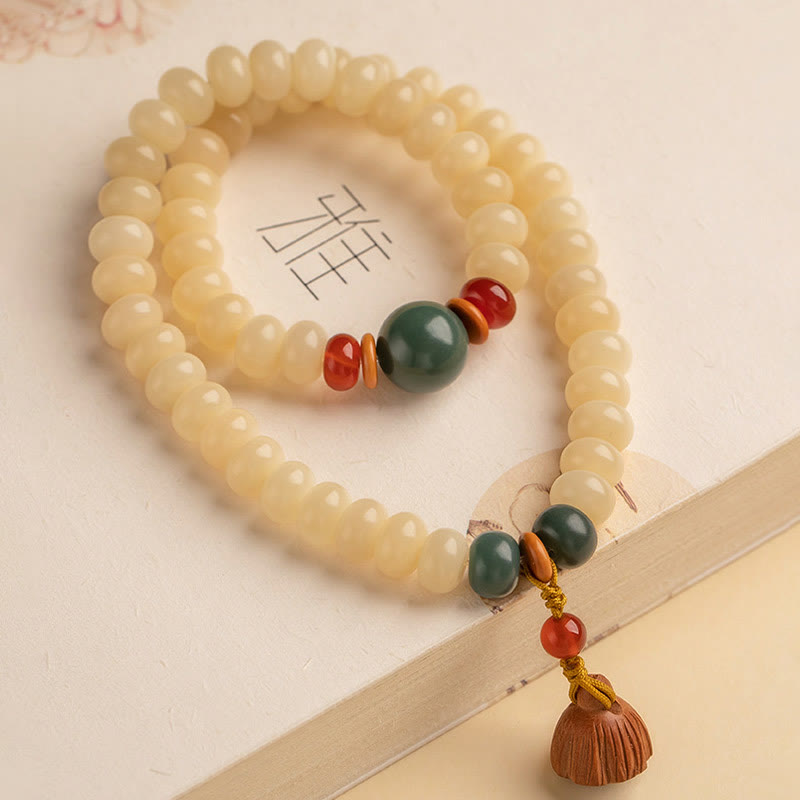 Bracelet double tour avec breloque en forme de gousse de lotus et graines de Bodhi et Buddha Stones