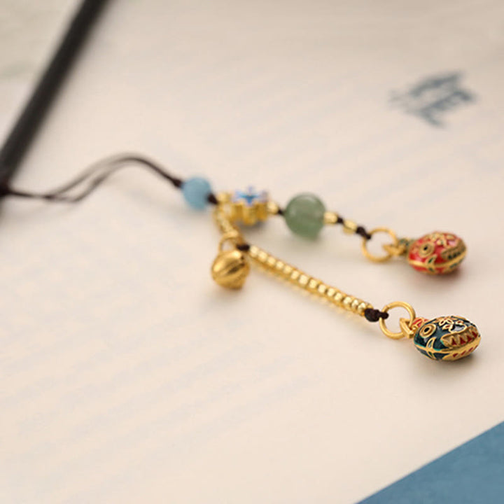 Porte-clés porte-bonheur de la famille des bêtes avaleuses d'or