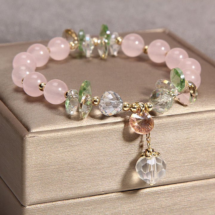 Bracelet à breloques en cristal rose œil de chat Buddha Stones - image 2