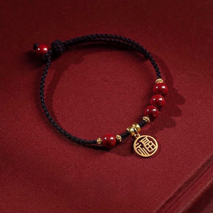 Bracelet tressé avec breloque et bénédiction en perles de cinabre et Buddha Stones