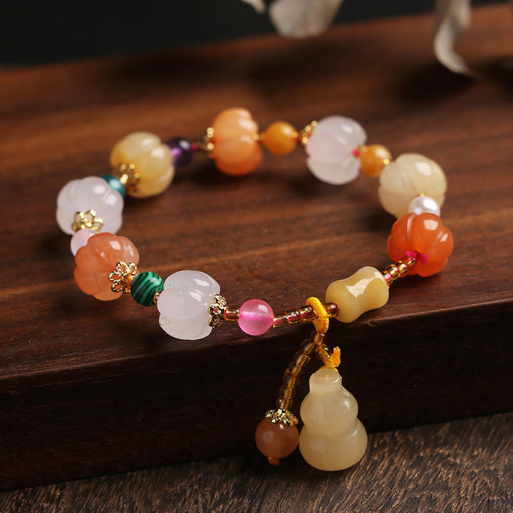 Bracelet à breloques en perles de citrouille Pixiu en soie dorée naturelle et cristaux de jade