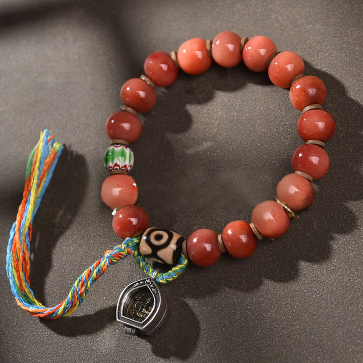 Bracelet porte-bonheur tibétain en perles dzi en Buddha Stones