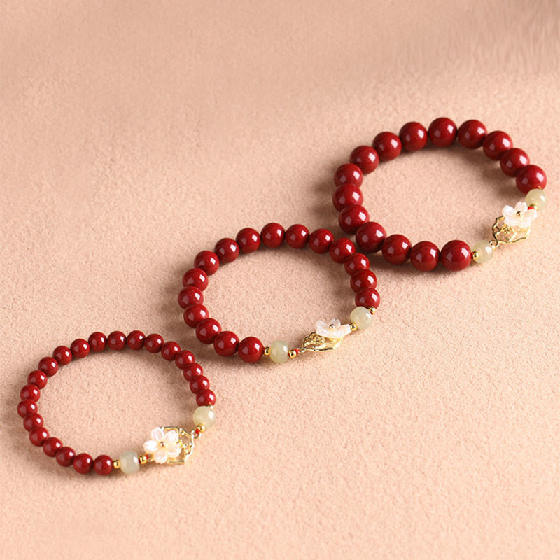 Bracelet de bénédiction en pierre de cinabre naturelle et jade Tridacna avec Buddha Stones