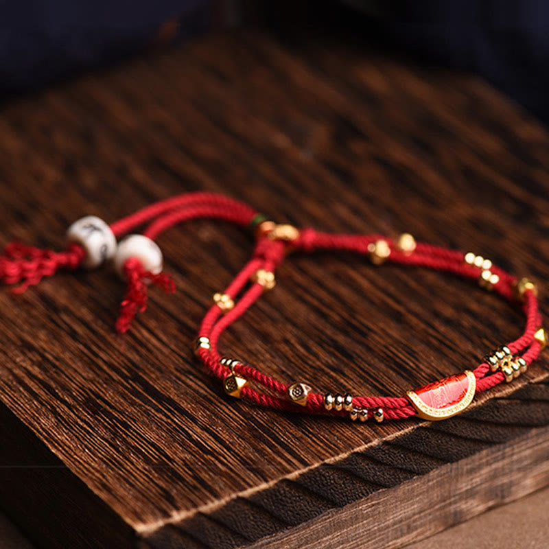 Bracelet en corde rouge tressée porte-bonheur en forme de boulettes de cinabre faites à la main par Buddha Stones