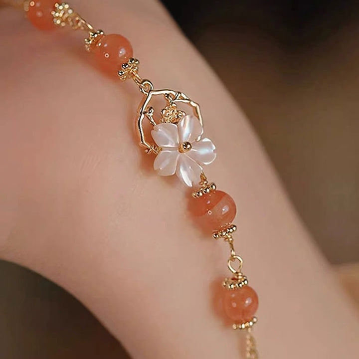Bracelet de confiance en forme de fleur en pierre d'agate rouge Tridacna de Buddha Stones