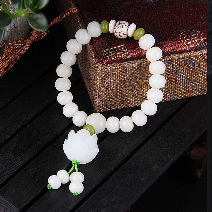 Bracelet porte-bonheur en Buddha Stones et lotus blanc naturel