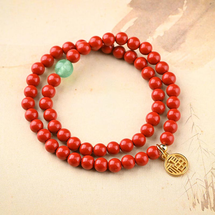 Collier porte-bonheur tibétain en aventurine verte et cinabre avec Buddha Stones