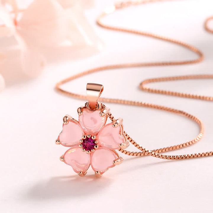 Collier avec pendentif apaisant en forme de cœur et de fleur en cristal rose de Buddha Stones