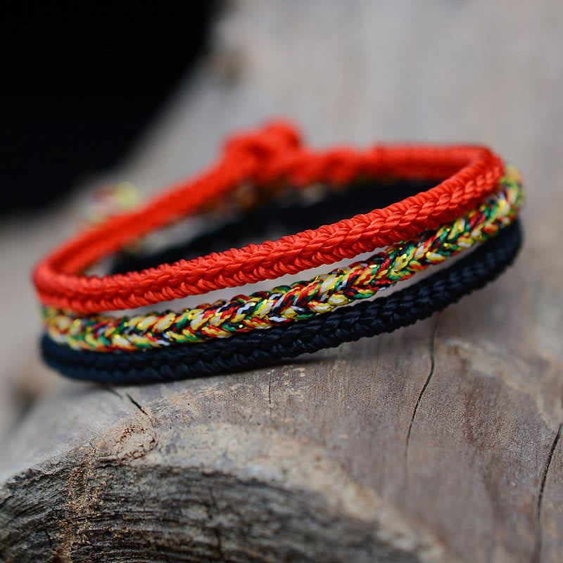 Bracelet tibétain en corde tressée à huit fils avec nœud de paix et protection fait main en Buddha Stones