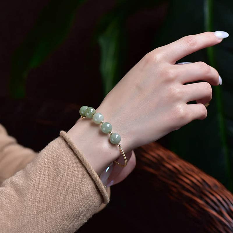 Bracelet jonc en jade avec Buddha Stones et bénédictions pour la chance et l'abondance