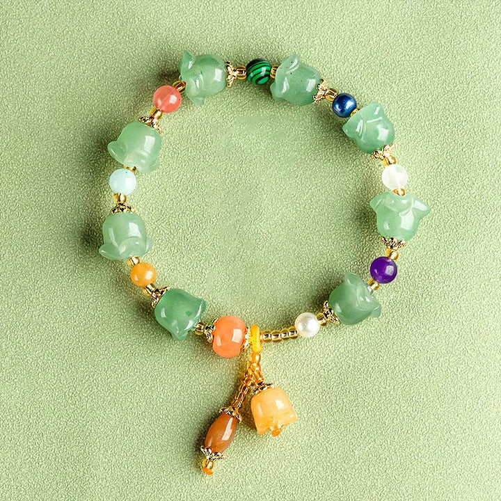 Bracelet porte-bonheur en aventurine verte et fleur de magnolia de Buddha Stones