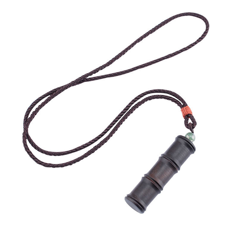 Collier pendentif en forme de boîte de prière Ghau en bois d'ébène et bambou avec Buddha Stones