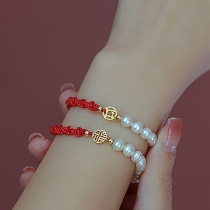 Bracelet tressé en fil rouge avec perles de protection et de chance plaquées or 14 carats