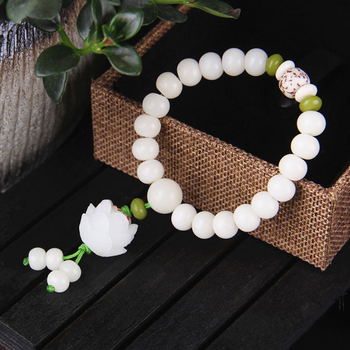 Bracelet porte-bonheur en Buddha Stones et lotus blanc naturel