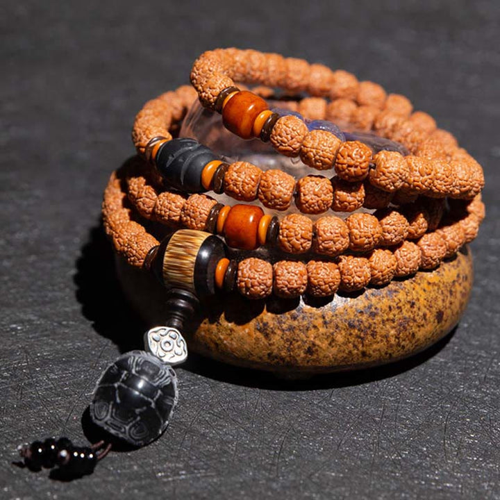 Bracelet tibétain en 108 perles de Mala Rudraksha Bodhi Seed Zodiac chinois Bouddha natal Richesse Charm