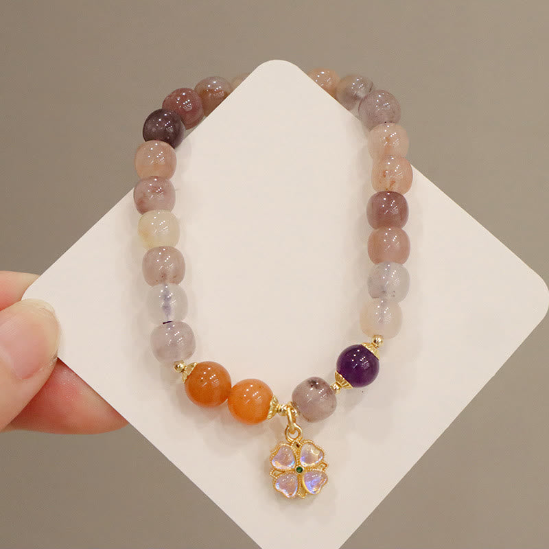 Bracelet de richesse en perles de jade violet doré en Buddha Stones