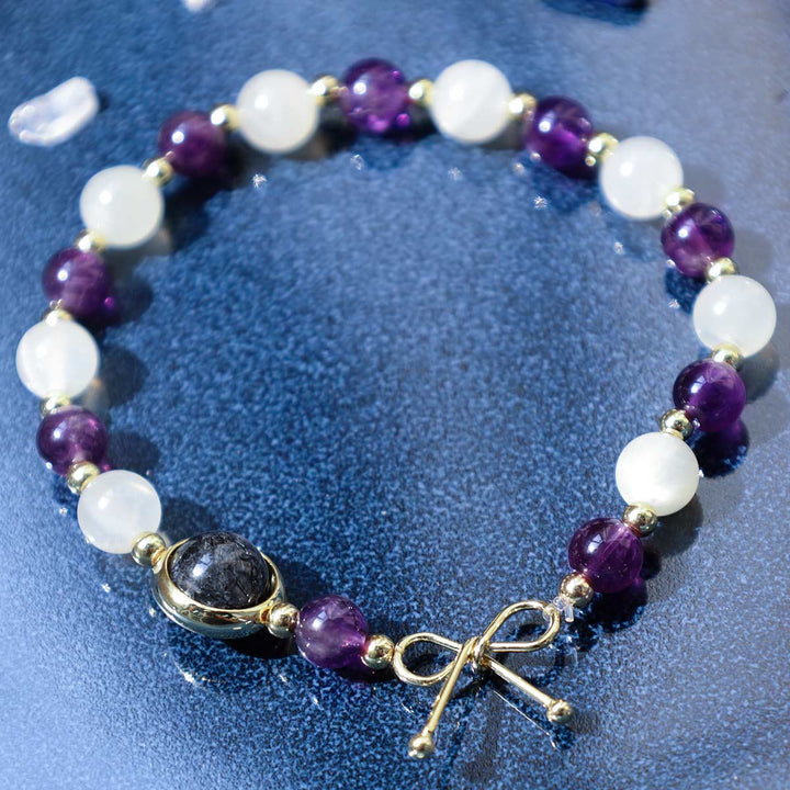 Bracelet de perles spirituelles en quartz rutile noir et améthyste œil de chat - image 5
